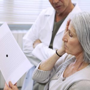 Woman looking at amsler grid