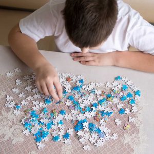 Child doing puzzle