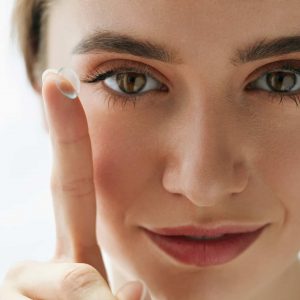 woman with a contact lens