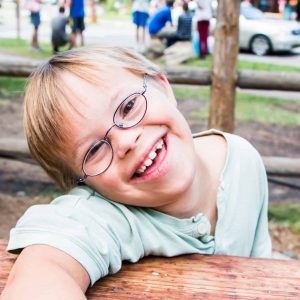 Special needs child wearing glasses